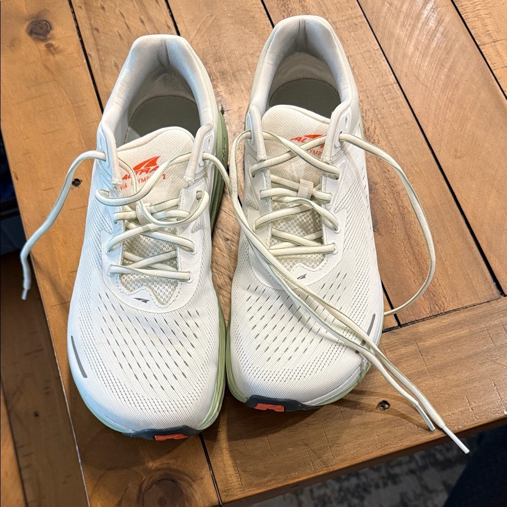 Altra White Running Shoes with Light Green and Orange Accents